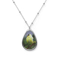 Teardrop-shaped pendant with a goldfinch photo