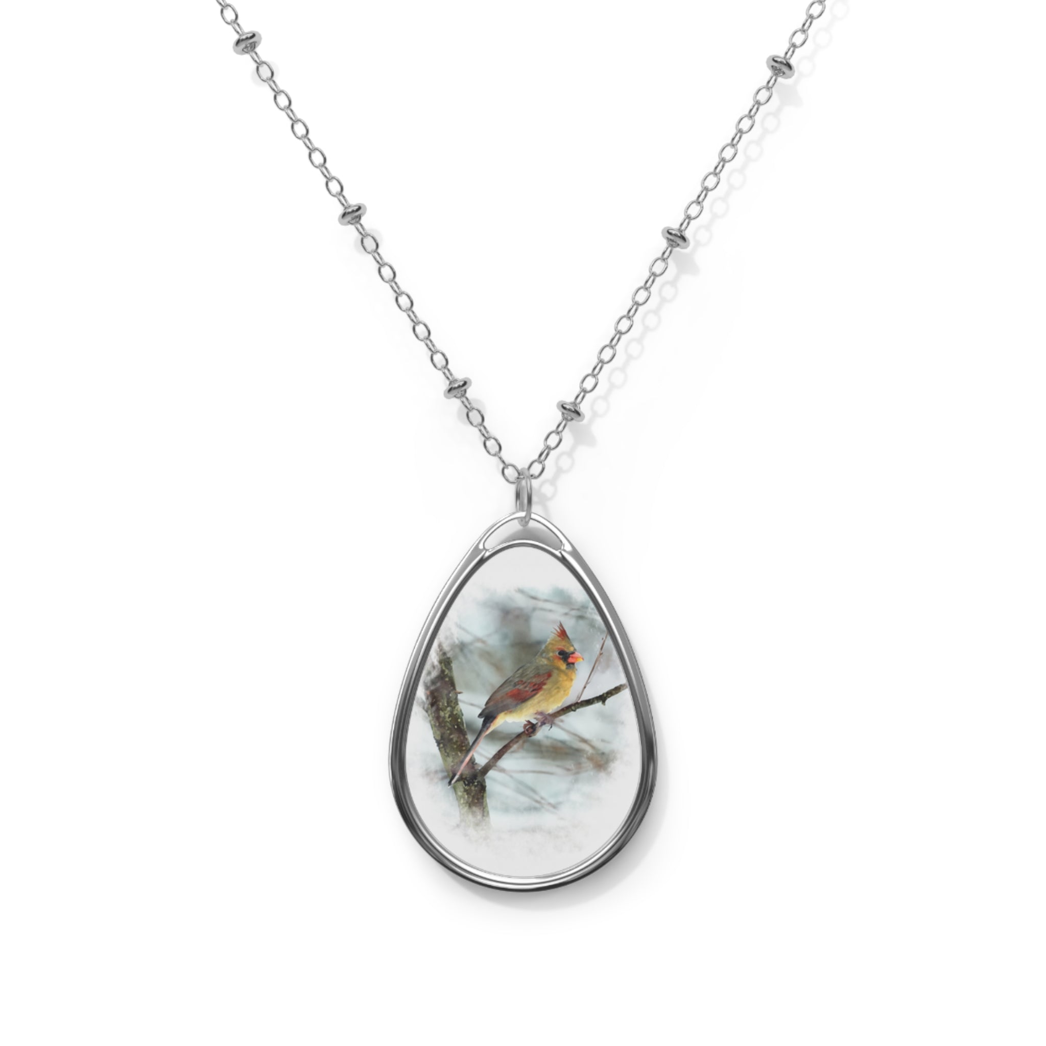 Teardrop-shaped pendant with a female northern cardinal photo