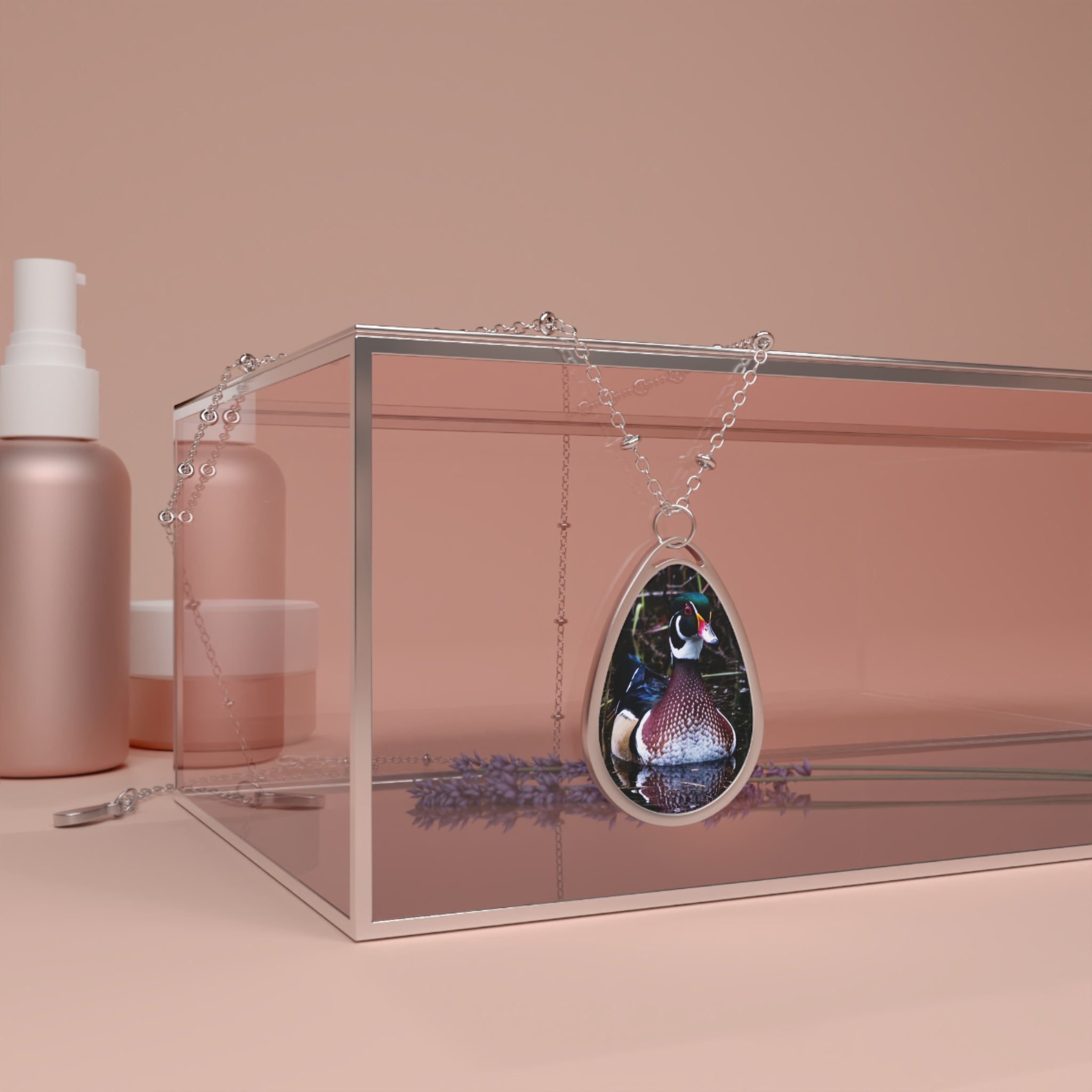 Teardrop-shaped pendant with a wood duck photo