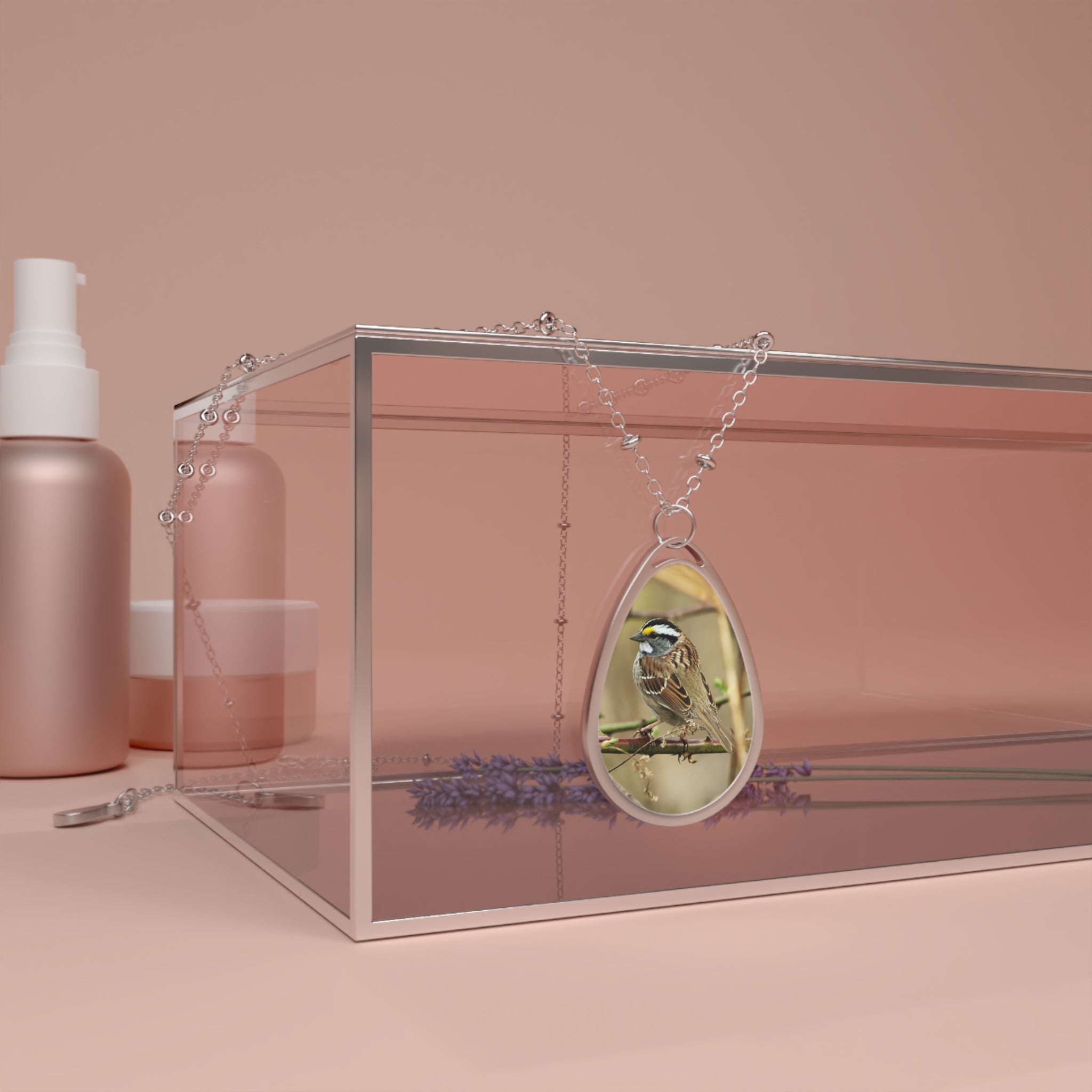 Teardrop-shaped pendant with a white-throated sparrow photo
