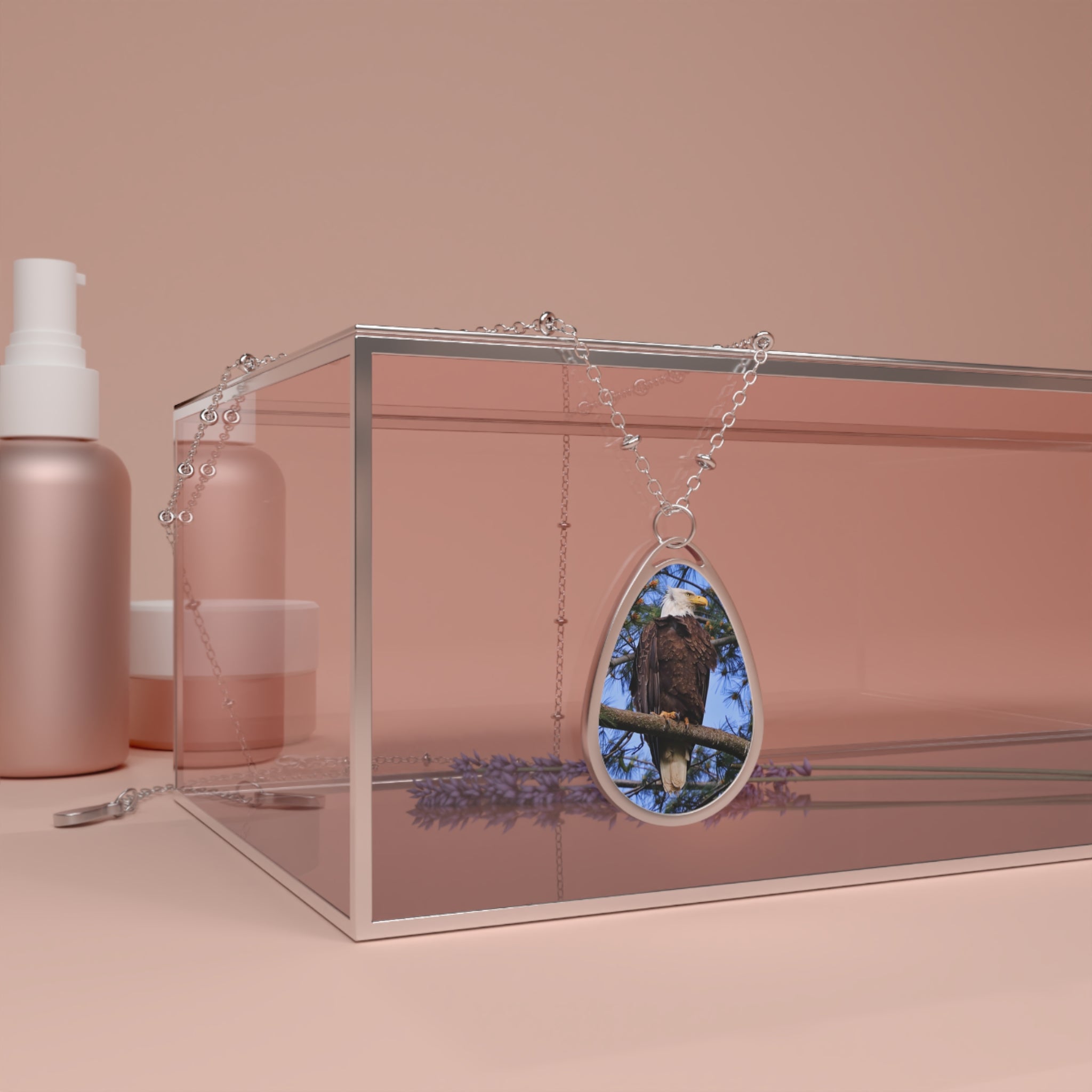 Teardrop-shaped pendant with a bald eagle photo