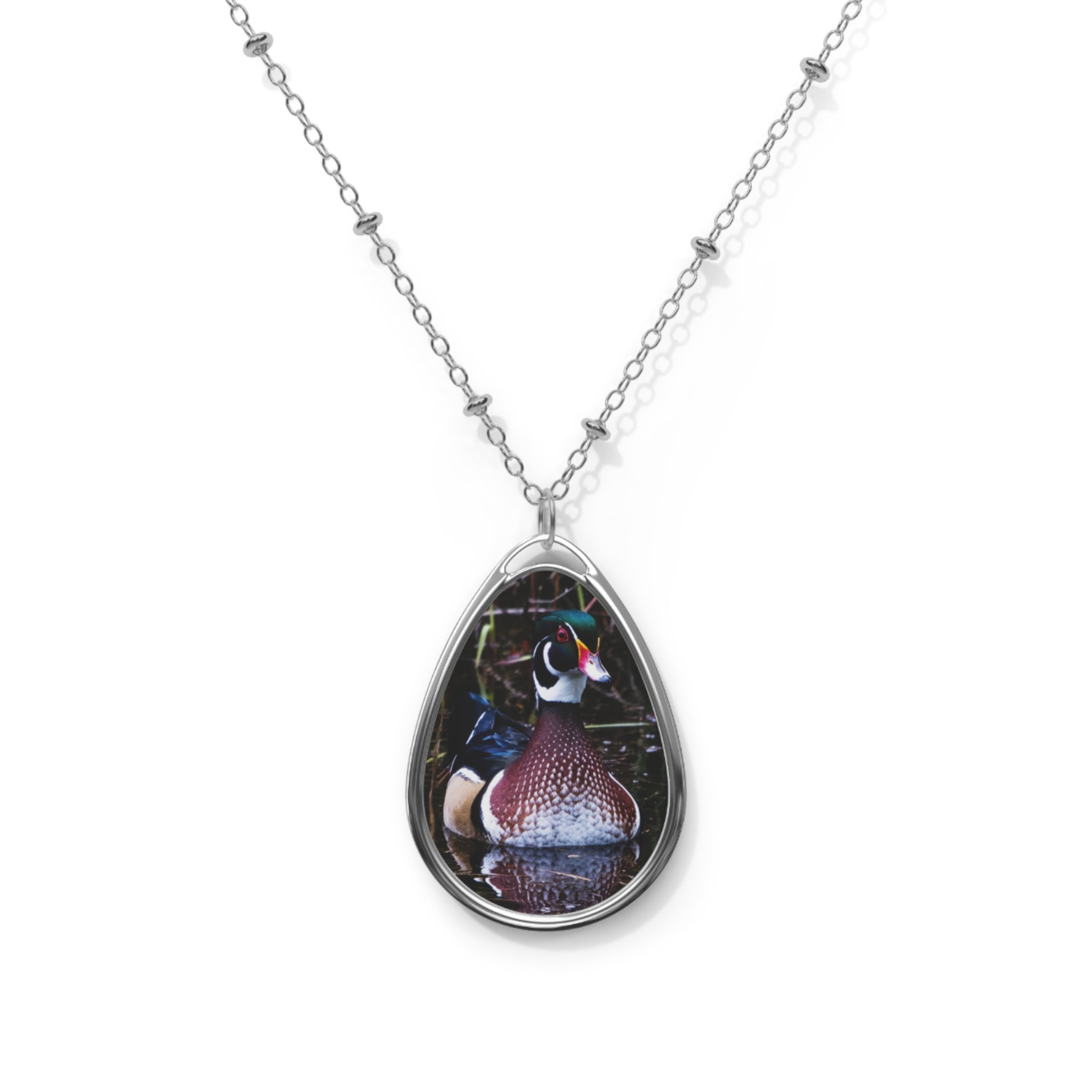 Teardrop-shaped pendant with a wood duck photo