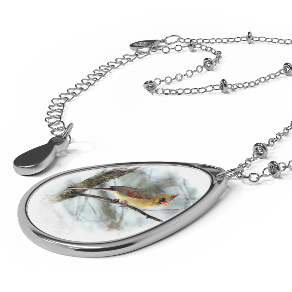 Teardrop-shaped pendant with a female northern cardinal photo